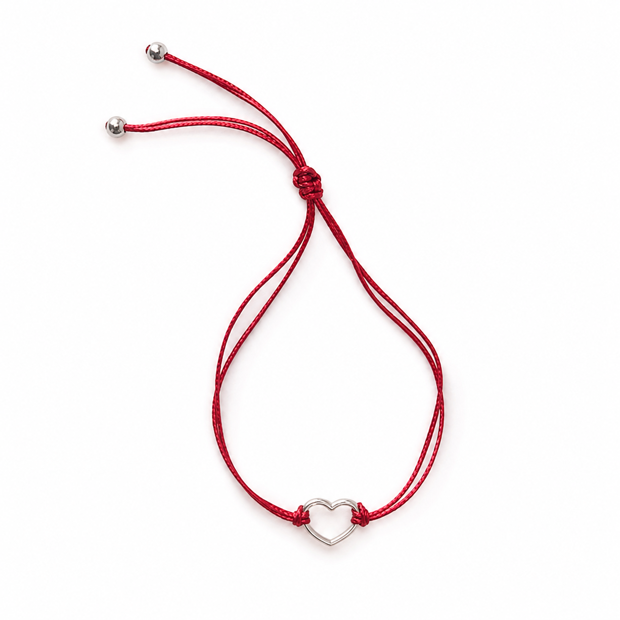 Bracelet Célia avec cœur en acier inoxydable argenté sur cordon rouge bordeaux ajustable.
