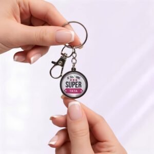 Porte-clé « Je suis une super tata » avec cabochon en verre argenté.