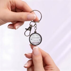 Porte-clé « Je suis un animateur plus que parfait » avec cabochon en verre argenté.
