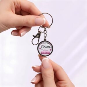 Porte-clé « Je suis une nounou plus que parfaite » avec cabochon en verre argenté.