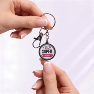 Porte-clé « Je suis une super AESH » avec cabochon en verre argenté.