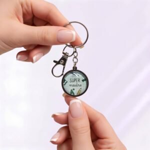 Porte-clé « Super maître » avec cabochon en verre argenté.