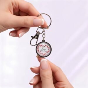 Porte-clé Super maîtresse avec fleur en cabochon de verre argenté.