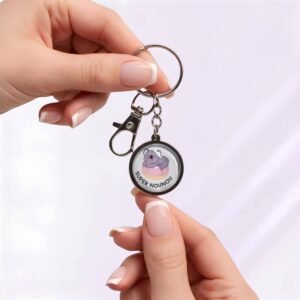Porte-clé « Super nounou » avec cabochon en verre argenté.