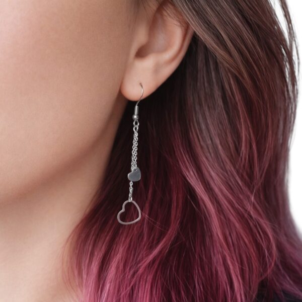 Boucles d’Oreilles Double Cœur – bijou élégant en acier inoxydable signé Floya Boutique.